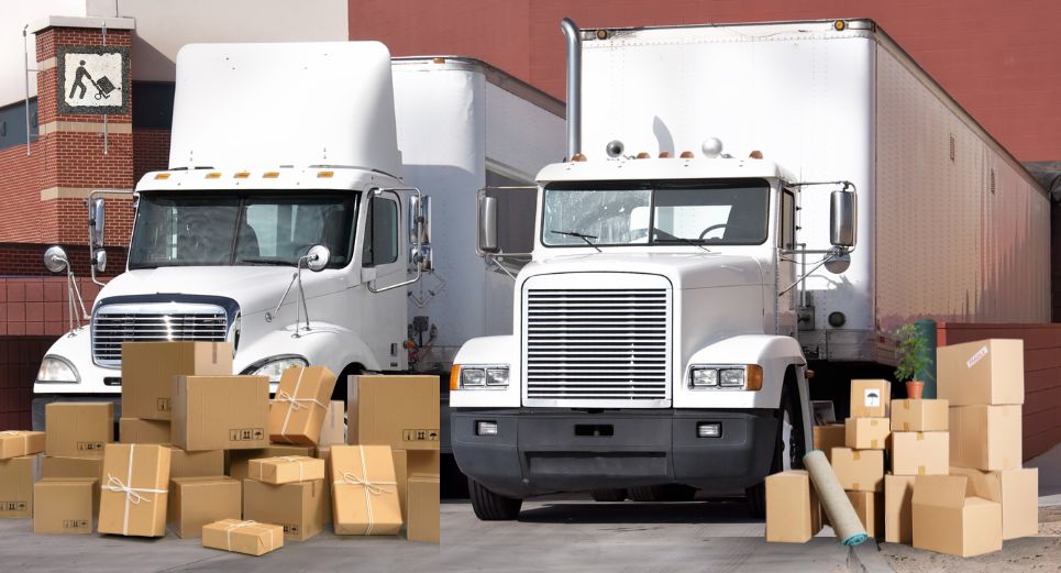 An image showing two big trucks with lots unpacked brown boxes